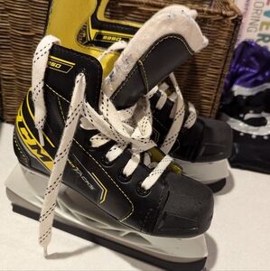CCM Black and Yellow Ice Skates